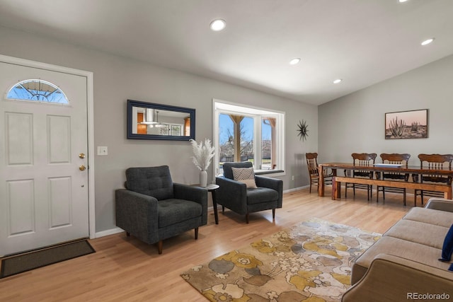 3785 E 134th Ct, Thornton, CO 80241 - living area with light wood-style flooring, lofted ceiling, and recessed lighting