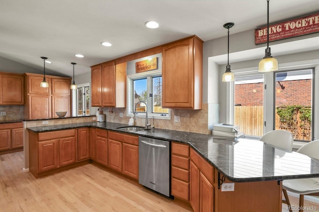 3785 E 134th Ct, Thornton, CO 80241 - kitchen featuring dishwasher, a peninsula, light wood finished floors, decorative backsplash, and recessed lighting
