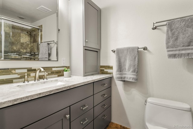 3785 E 134th Ct, Thornton, CO 80241 - full bath with vanity, tasteful backsplash, and tiled shower