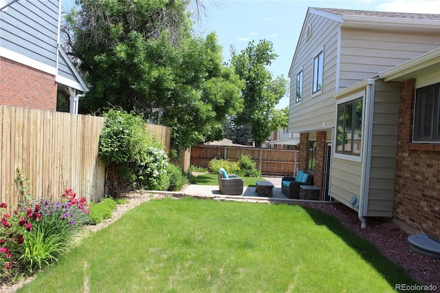 3785 E 134th Ct, Thornton, CO 80241 - fenced backyard featuring an outdoor living space and a patio area