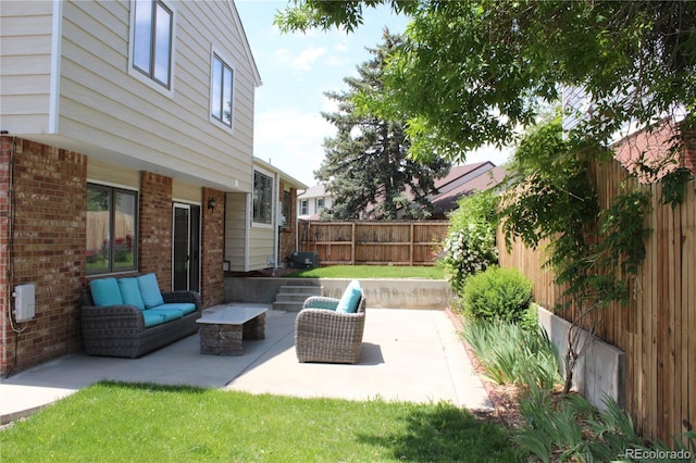 3785 E 134th Ct, Thornton, CO 80241 - fenced backyard featuring an outdoor living space, a patio, and a grill