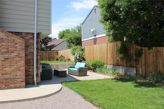 3785 E 134th Ct, Thornton, CO 80241 - fenced backyard with a patio area and outdoor lounge area
