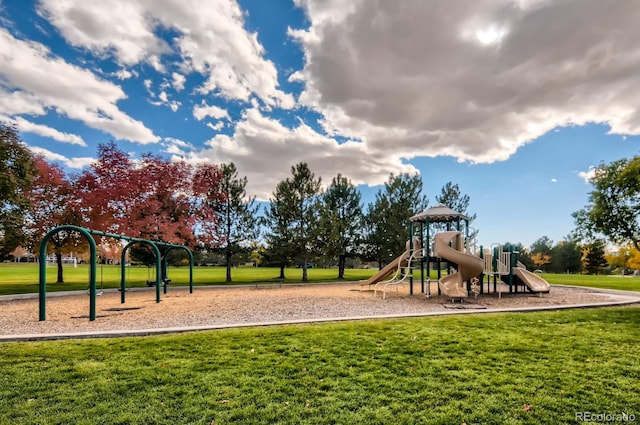 community play area featuring a lawn