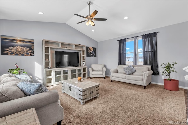 living room with lofted ceiling, carpet floors, and ceiling fan