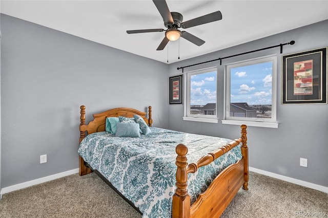 bedroom with light carpet and ceiling fan