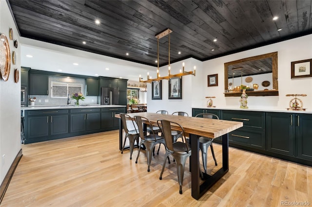 dining room with wooden ceiling and light wood finished floors