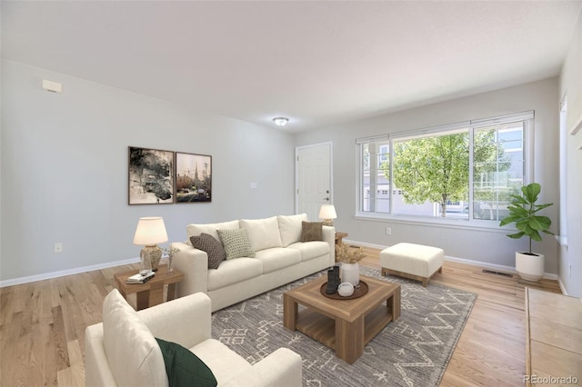 living room featuring light wood-type flooring