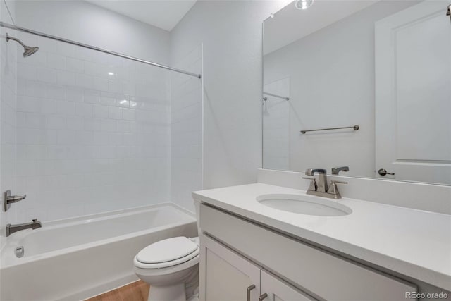 full bathroom with toilet, shower / tub combination, vanity, and wood finished floors