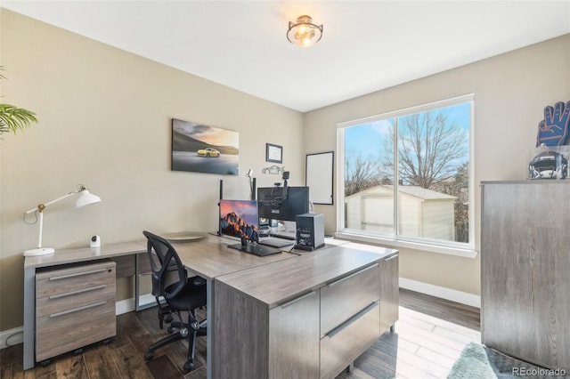 office space featuring dark wood finished floors and baseboards