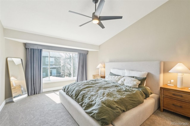 bedroom with lofted ceiling, carpet, baseboards, and ceiling fan