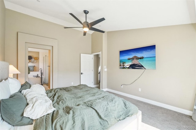 bedroom with baseboards, lofted ceiling, carpet, and a ceiling fan