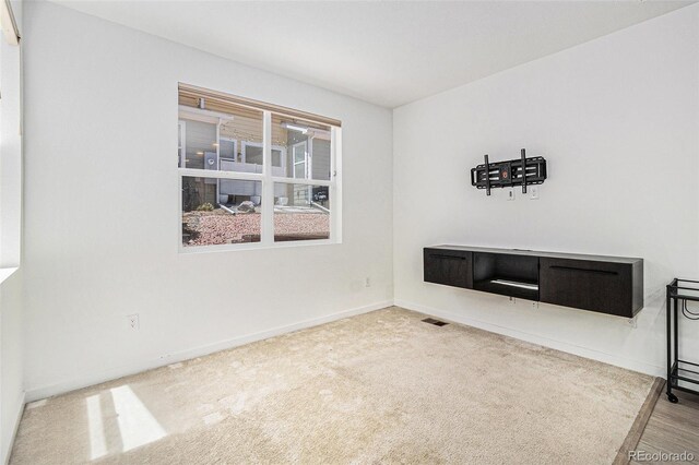 9757 Ash Ln, Thornton, CO 80229 - carpeted spare room with baseboards