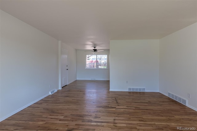 6013 W 62nd Ave, Arvada, CO 80033 - spare room with wood finished floors, baseboards, and ceiling fan