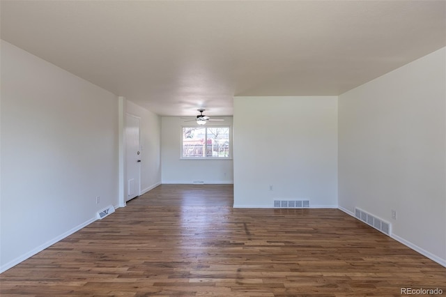 6013 W 62nd Ave, Arvada, CO 80033 - empty room featuring wood finished floors, ceiling fan, and baseboards