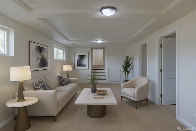 6013 W 62nd Ave, Arvada, CO 80033 - living area featuring a raised ceiling, light carpet, and baseboards