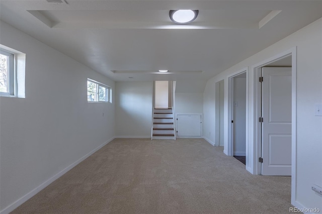 6013 W 62nd Ave, Arvada, CO 80033 - basement with light colored carpet, stairway, and baseboards