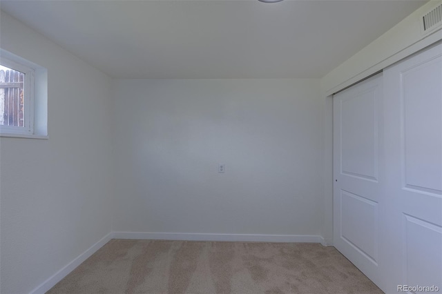 6013 W 62nd Ave, Arvada, CO 80033 - unfurnished bedroom featuring light carpet, baseboards, and a closet