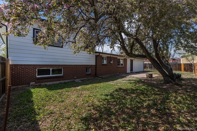 6013 W 62nd Ave, Arvada, CO 80033 - back of house featuring brick siding