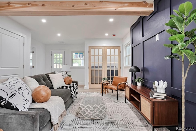 1360 W Custer Pl, Denver, CO 80223 - living room with recessed lighting, french doors, and light wood finished floors