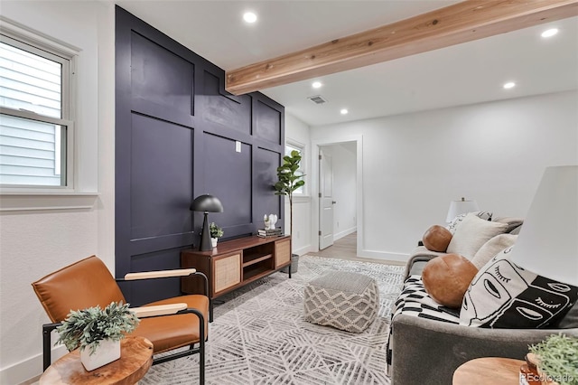 1360 W Custer Pl, Denver, CO 80223 - living area with beam ceiling, healthy amount of natural light, recessed lighting, and light wood-style floors