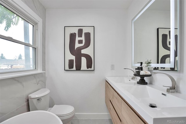 1360 W Custer Pl, Denver, CO 80223 - bathroom with double vanity and toilet
