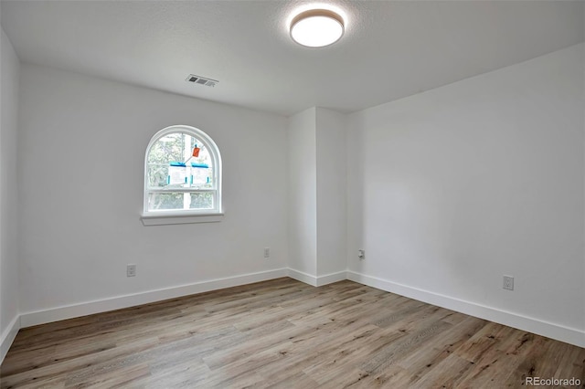1360 W Custer Pl, Denver, CO 80223 - empty room featuring wood finished floors and baseboards