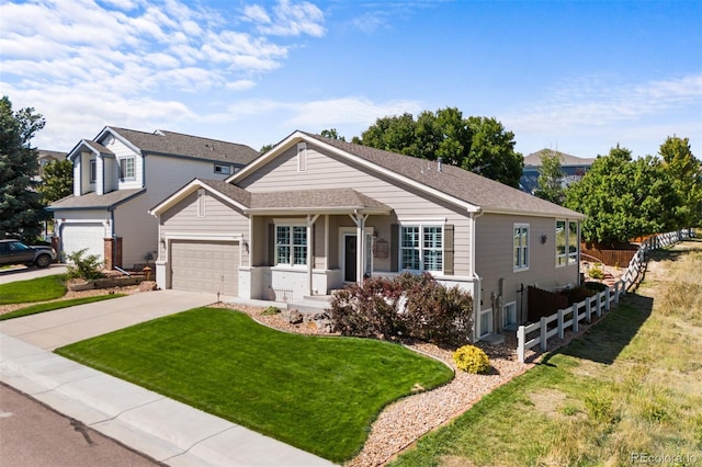 view of front facade featuring a front lawn and a garage