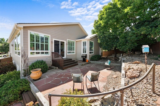 rear view of house featuring a patio area