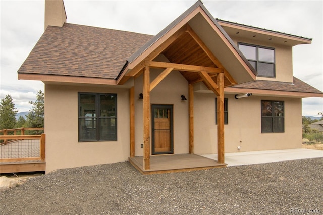 30490 Harvard Cir, Buena Vista, CO 81211 - back of property with a shingled roof and stucco siding