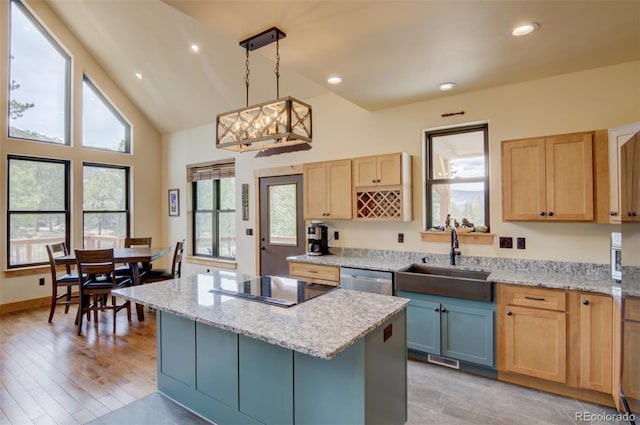 30490 Harvard Cir, Buena Vista, CO 81211 - kitchen featuring a sink, light brown cabinetry, black electric cooktop, healthy amount of natural light, and recessed lighting