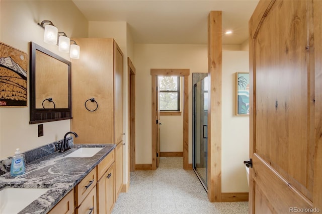 30490 Harvard Cir, Buena Vista, CO 81211 - full bath featuring baseboards, double vanity, and a stall shower