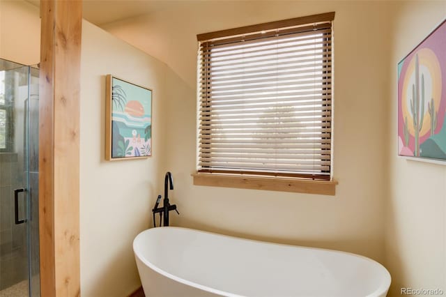 30490 Harvard Cir, Buena Vista, CO 81211 - bathroom featuring a shower stall and a freestanding tub
