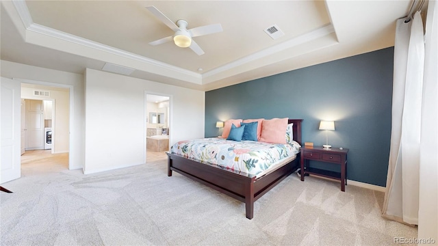 5932 Eldora St, Golden, CO 80403 - carpeted bedroom with a tray ceiling, crown molding, baseboards, connected bathroom, and a ceiling fan