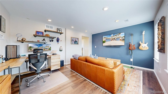 5932 Eldora St, Golden, CO 80403 - living room featuring wood finished floors, baseboards, and recessed lighting