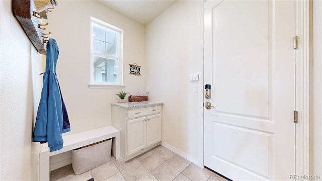 5932 Eldora St, Golden, CO 80403 - foyer with baseboards and light tile patterned floors