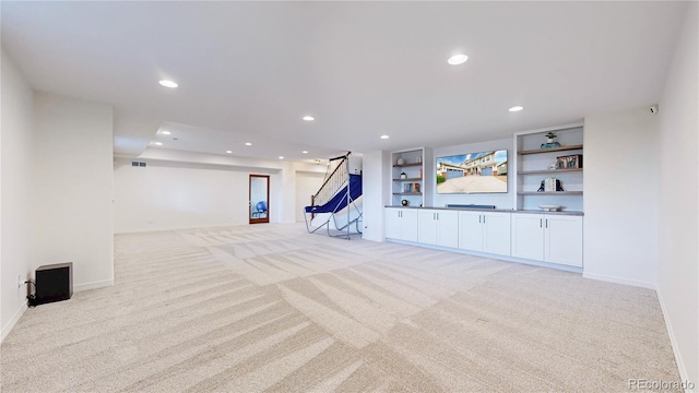 5932 Eldora St, Golden, CO 80403 - below grade area featuring light colored carpet, recessed lighting, and baseboards