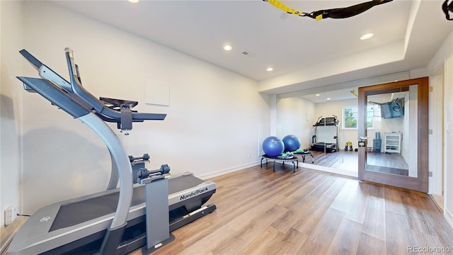 5932 Eldora St, Golden, CO 80403 - exercise room featuring wood finished floors, recessed lighting, and baseboards