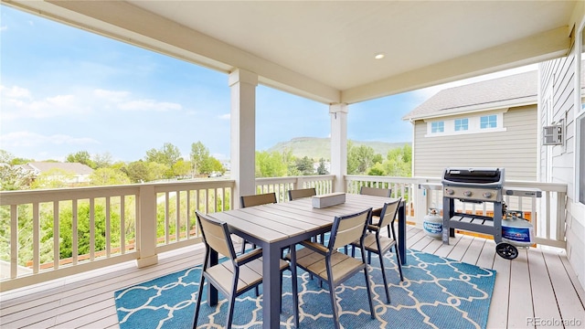 5932 Eldora St, Golden, CO 80403 - deck featuring outdoor dining area, a mountain view, and grilling area