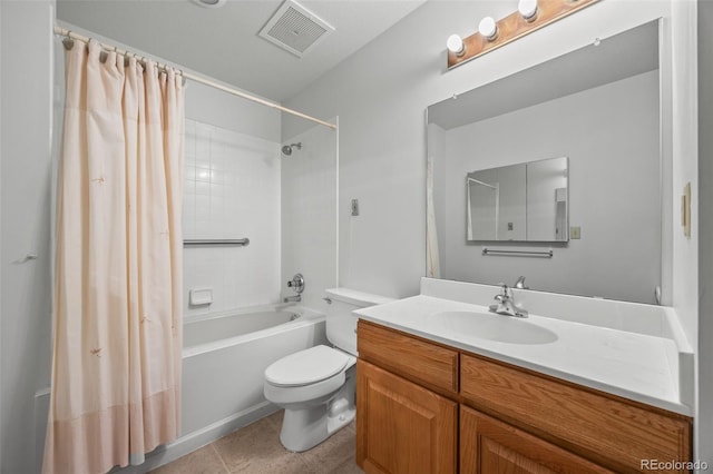 bathroom featuring vanity, visible vents, shower / tub combo, tile patterned floors, and toilet