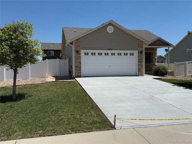 6836 Loudon St, Wellington, CO 80549 - ranch-style house with stone siding, driveway, a garage, and a shingled roof