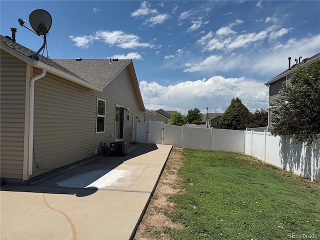 6836 Loudon St, Wellington, CO 80549 - fenced backyard with a patio and a gate