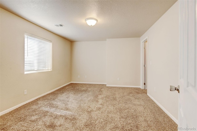 6836 Loudon St, Wellington, CO 80549 - carpeted empty room with a textured ceiling and baseboards