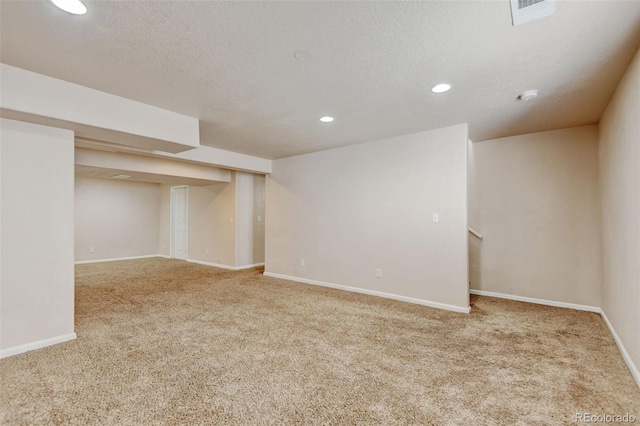 6836 Loudon St, Wellington, CO 80549 - finished below grade area featuring carpet floors, recessed lighting, and a textured ceiling