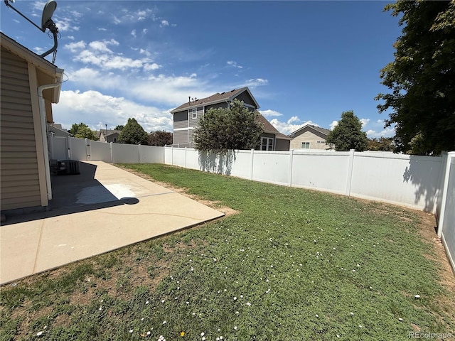 6836 Loudon St, Wellington, CO 80549 - fenced backyard featuring a patio