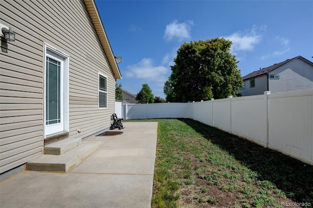 6836 Loudon St, Wellington, CO 80549 - fenced backyard with a patio