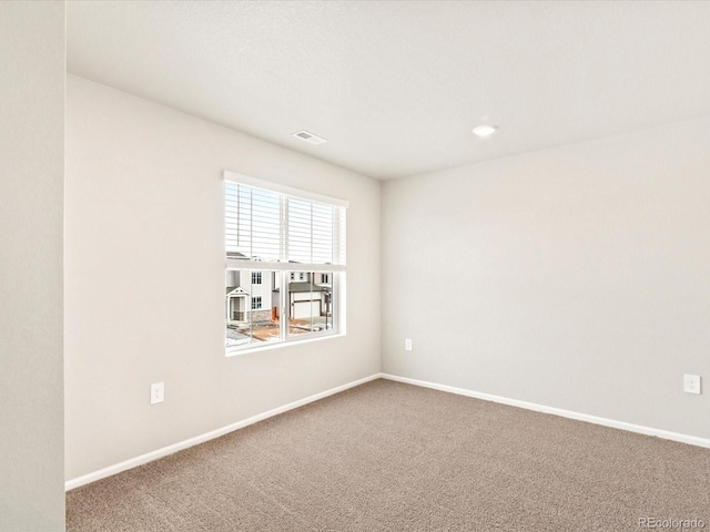 view of carpeted spare room