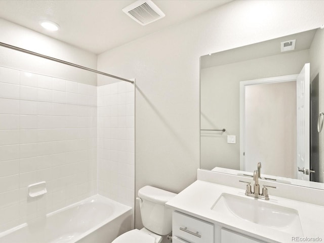 full bathroom featuring toilet, vanity, and  shower combination