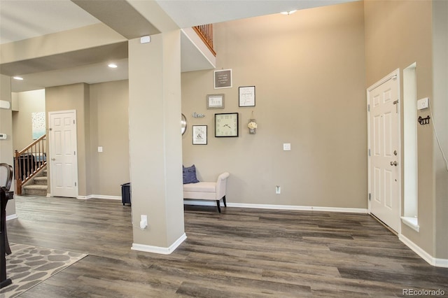 15122 Fillmore Way, Thornton, CO 80602 - entrance foyer featuring dark wood-style floors, stairs, and recessed lighting
