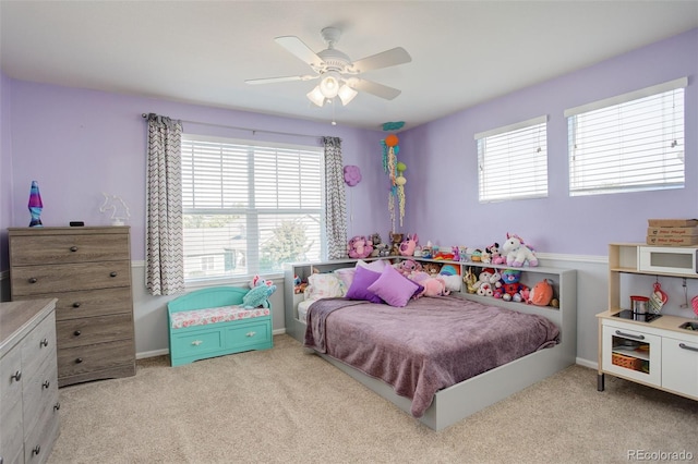 15122 Fillmore Way, Thornton, CO 80602 - bedroom featuring light carpet and a ceiling fan
