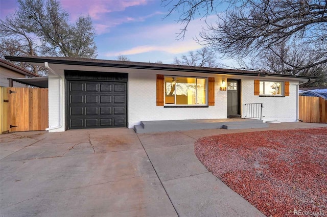 single story home with a garage